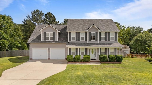 11 Checkmate Ct, Cameron, NC 28326 - view of front facade featuring concrete driveway, covered porch, roof with shingles, and a garage