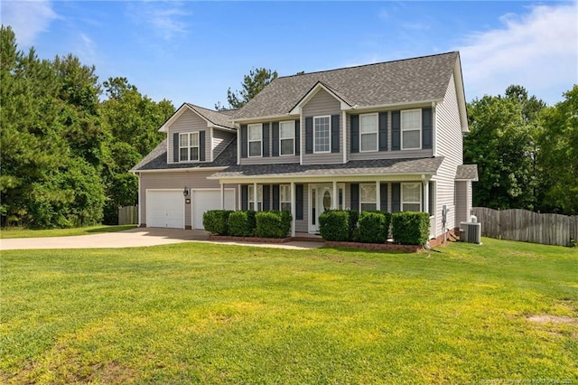 11 Checkmate Ct, Cameron, NC 28326 - view of front of property with driveway, central AC, a porch, an attached garage, and a shingled roof
