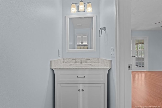 11 Checkmate Ct, Cameron, NC 28326 - bathroom with wood finished floors, vanity, and baseboards