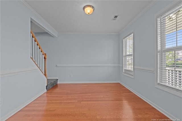 11 Checkmate Ct, Cameron, NC 28326 - unfurnished room with stairs, wood finished floors, ornamental molding, and baseboards