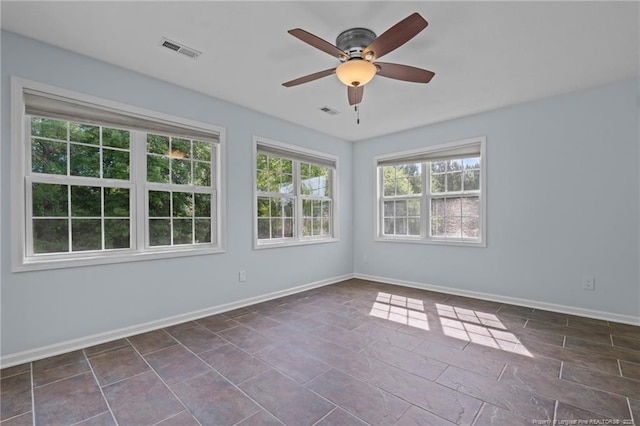 11 Checkmate Ct, Cameron, NC 28326 - unfurnished room with a ceiling fan and baseboards