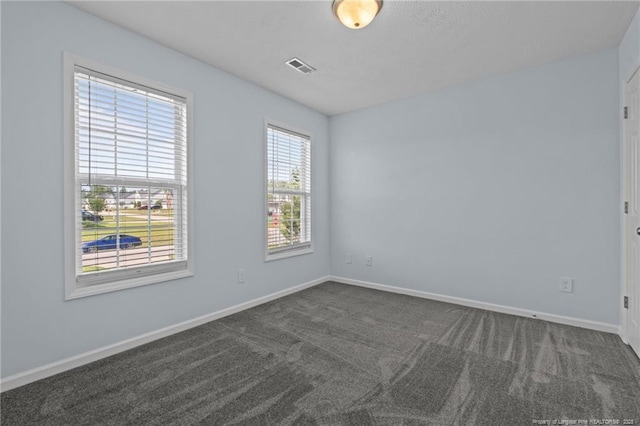 11 Checkmate Ct, Cameron, NC 28326 - unfurnished room featuring dark colored carpet and baseboards