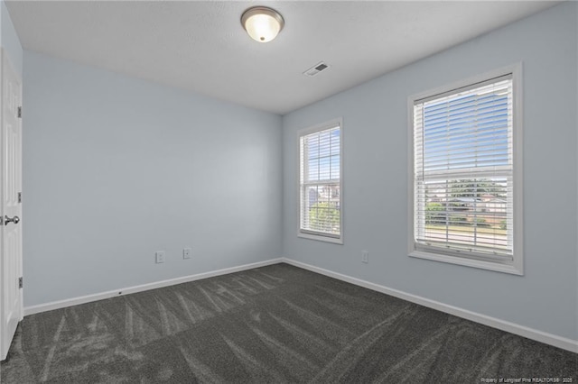 11 Checkmate Ct, Cameron, NC 28326 - unfurnished room with dark carpet and baseboards