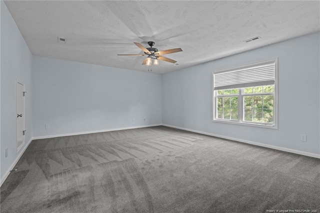 11 Checkmate Ct, Cameron, NC 28326 - carpeted empty room with ceiling fan, baseboards, and a textured ceiling