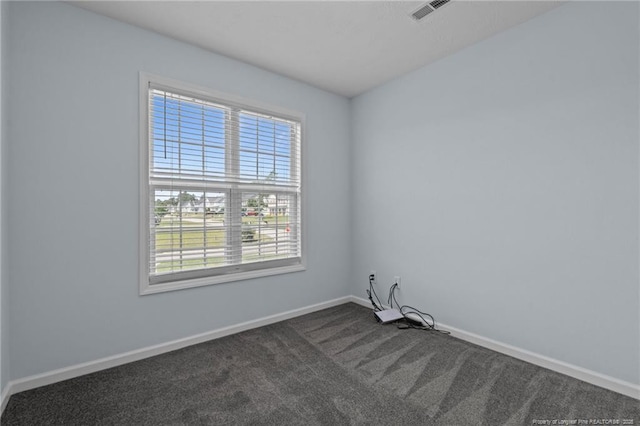11 Checkmate Ct, Cameron, NC 28326 - unfurnished room with dark carpet and baseboards