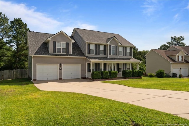 11 Checkmate Ct, Cameron, NC 28326 - colonial-style house with driveway, covered porch, a shingled roof, and an attached garage