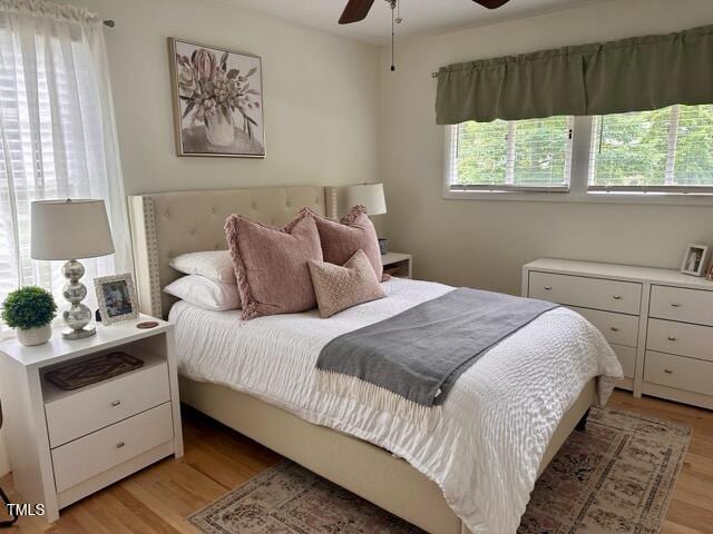 3620 Arrowwood Dr, Raleigh, NC 27604 - bedroom featuring light wood-style floors and a ceiling fan