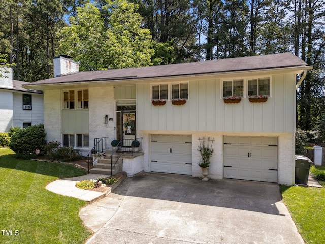 3620 Arrowwood Dr, Raleigh, NC 27604 - raised ranch featuring an attached garage, brick siding, a chimney, concrete driveway, and a front yard