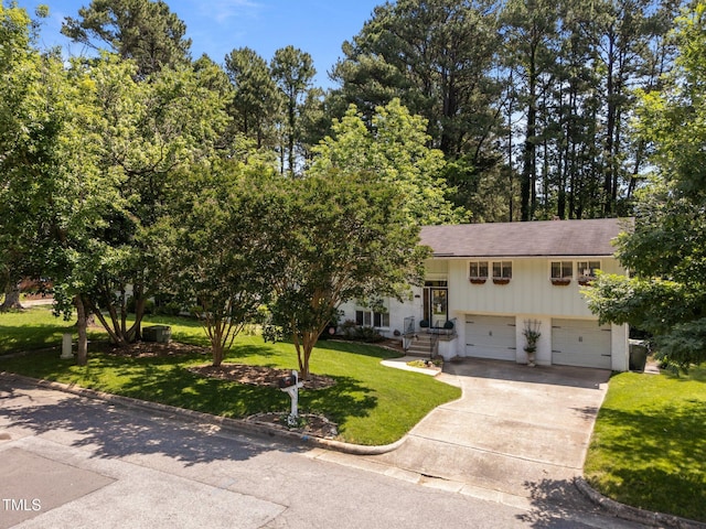 3620 Arrowwood Dr, Raleigh, NC 27604 - view of front of house featuring driveway, an attached garage, and a front yard