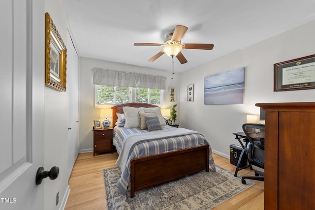 3620 Arrowwood Dr, Raleigh, NC 27604 - bedroom with light wood-style floors, baseboards, and ceiling fan