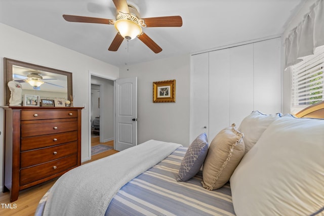 3620 Arrowwood Dr, Raleigh, NC 27604 - bedroom featuring light wood finished floors, a closet, and a ceiling fan
