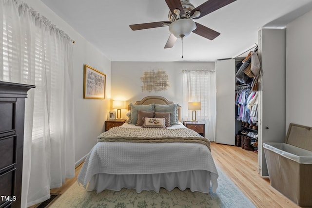 3620 Arrowwood Dr, Raleigh, NC 27604 - bedroom featuring light wood finished floors, ceiling fan, and a closet
