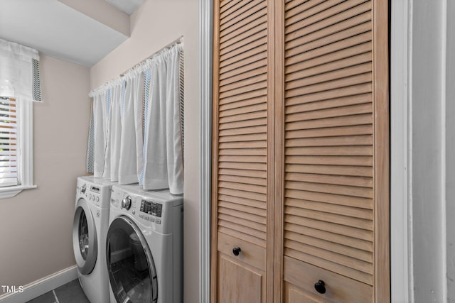 3620 Arrowwood Dr, Raleigh, NC 27604 - washroom featuring washer and dryer, tile patterned floors, and baseboards