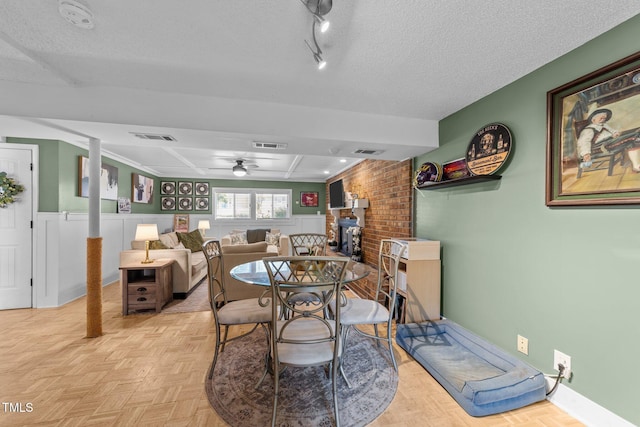 3620 Arrowwood Dr, Raleigh, NC 27604 - dining space featuring a textured ceiling, ceiling fan, and baseboards