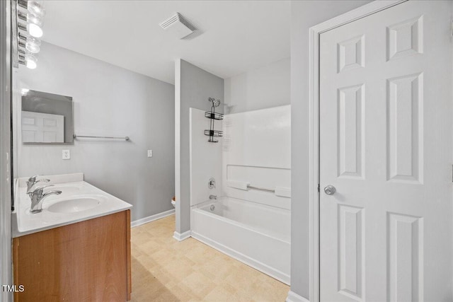 8630 Neuse Lndg Unit 105, Raleigh, NC 27616 - bathroom with tile patterned floors, double vanity, bathtub / shower combination, baseboards, and toilet