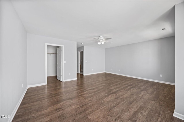 8630 Neuse Lndg Unit 105, Raleigh, NC 27616 - empty room featuring ceiling fan, dark wood finished floors, and baseboards