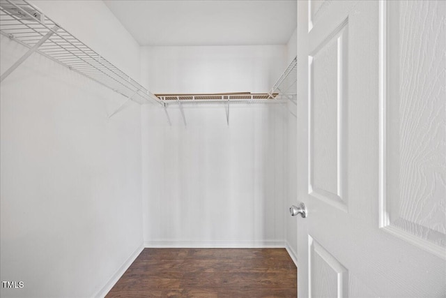 8630 Neuse Lndg Unit 105, Raleigh, NC 27616 - spacious closet featuring wood finished floors