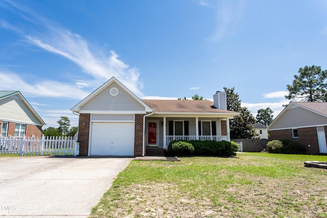 613 Sunnybrook Dr, Hope Mills, NC 28348 - view of front facade featuring covered porch, an attached garage, brick siding, concrete driveway, and a chimney