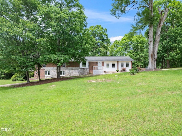 4605 Malor Dr, Wake Forest, NC 27587 - view of front of home with a front lawn