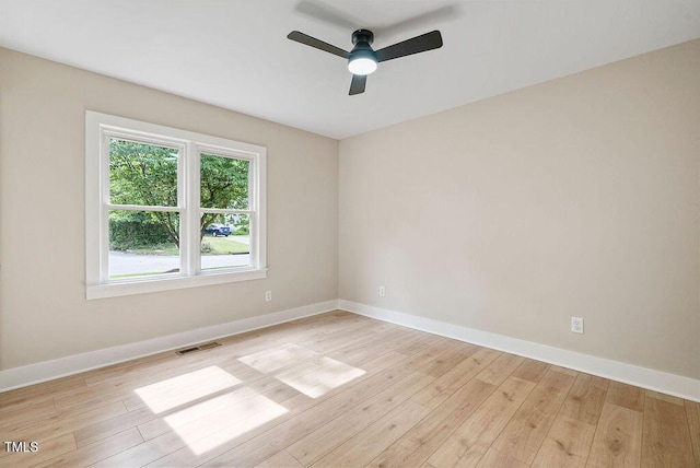 847 E Maple Ln, Fuquay Varina, NC 27526 - unfurnished room with a ceiling fan, light wood-type flooring, and baseboards