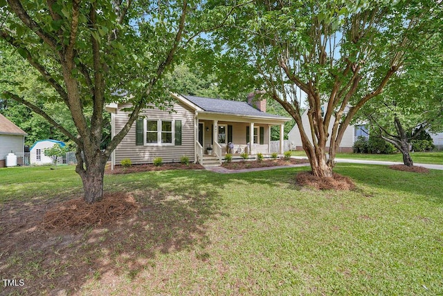 847 E Maple Ln, Fuquay Varina, NC 27526 - single story home featuring a chimney, a porch, and a front yard