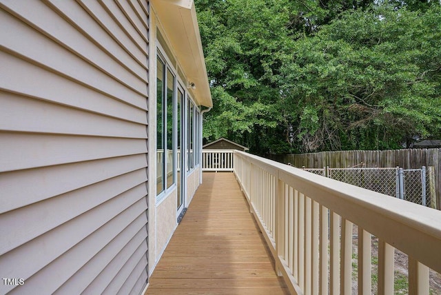 847 E Maple Ln, Fuquay Varina, NC 27526 - deck featuring view of wooded area