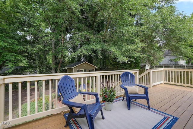 847 E Maple Ln, Fuquay Varina, NC 27526 - wooden deck featuring an outdoor structure