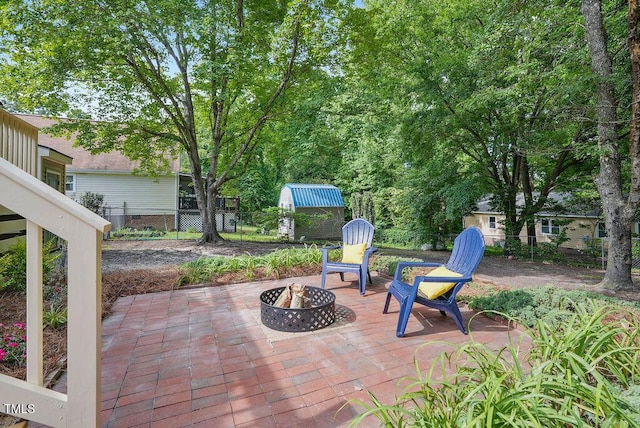 847 E Maple Ln, Fuquay Varina, NC 27526 - view of patio with an outdoor fire pit