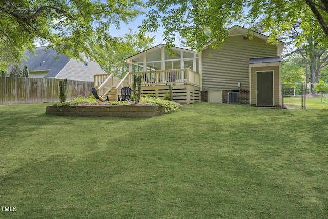 847 E Maple Ln, Fuquay Varina, NC 27526 - back of property with a sunroom, a deck, stairway, and central air condition unit