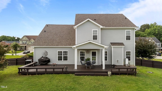 30 Sunbury Ct, Zebulon, NC 27597 - back of house with a shingled roof and a wooden deck