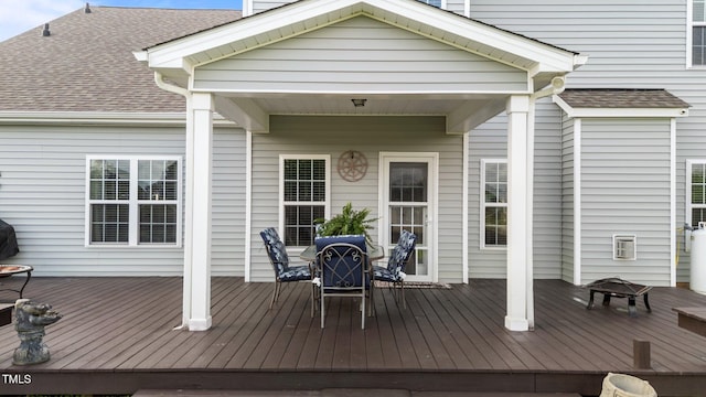 30 Sunbury Ct, Zebulon, NC 27597 - wooden terrace featuring a fire pit