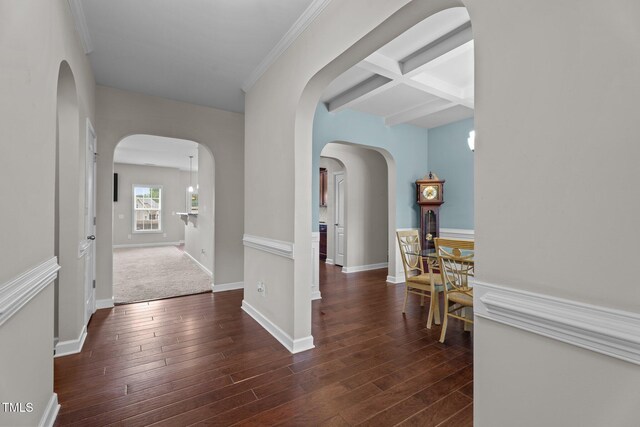 30 Sunbury Ct, Zebulon, NC 27597 - corridor with arched walkways, dark wood finished floors, baseboards, and beamed ceiling