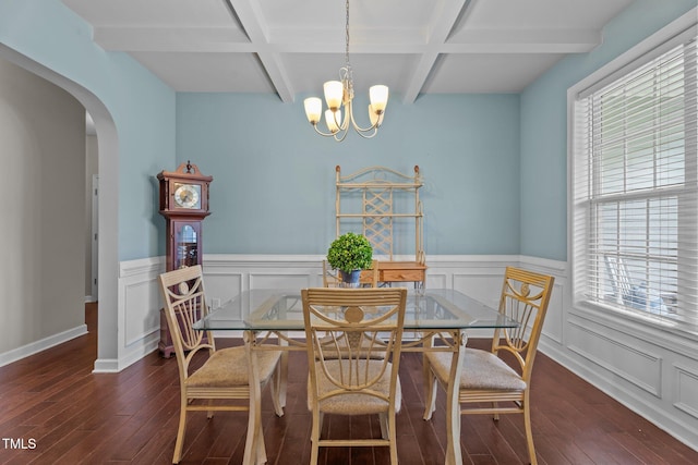 30 Sunbury Ct, Zebulon, NC 27597 - dining area featuring coffered ceiling, hardwood / wood-style floors, beamed ceiling, arched walkways, and healthy amount of natural light