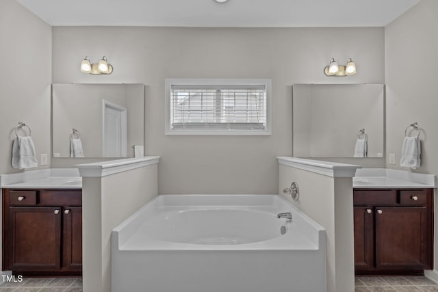 30 Sunbury Ct, Zebulon, NC 27597 - full bathroom featuring a bath and two vanities