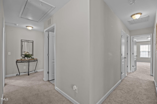 30 Sunbury Ct, Zebulon, NC 27597 - corridor with attic access, carpet, and baseboards