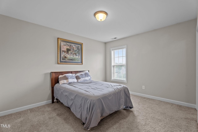 30 Sunbury Ct, Zebulon, NC 27597 - bedroom featuring baseboards and carpet floors