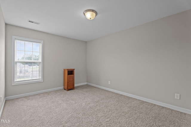 30 Sunbury Ct, Zebulon, NC 27597 - carpeted empty room featuring baseboards