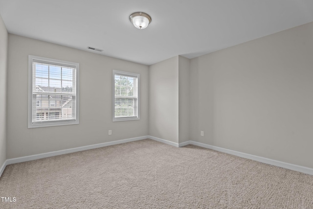 30 Sunbury Ct, Zebulon, NC 27597 - carpeted empty room with baseboards