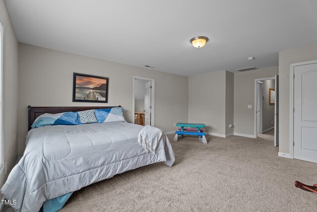 30 Sunbury Ct, Zebulon, NC 27597 - carpeted bedroom featuring baseboards