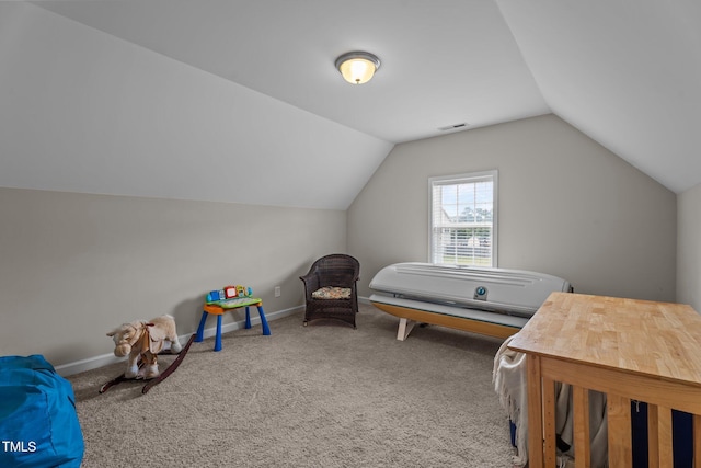 30 Sunbury Ct, Zebulon, NC 27597 - bedroom with lofted ceiling, carpet floors, and baseboards