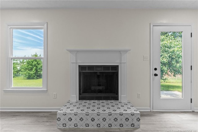 detailed view of wood finished floors and baseboards