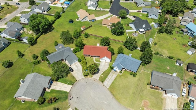 aerial view of property's location with nearby suburban area