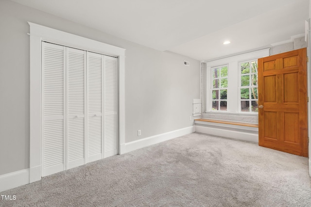 1008 Dorothea Dr, Raleigh, NC 27603 - unfurnished bedroom with carpet floors, a closet, baseboards, and recessed lighting