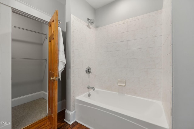 1008 Dorothea Dr, Raleigh, NC 27603 - bathroom with bathtub / shower combination and wood finished floors