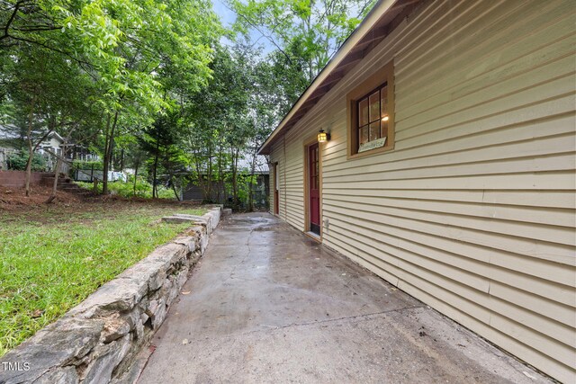 1008 Dorothea Dr, Raleigh, NC 27603 - view of side of home with a patio area