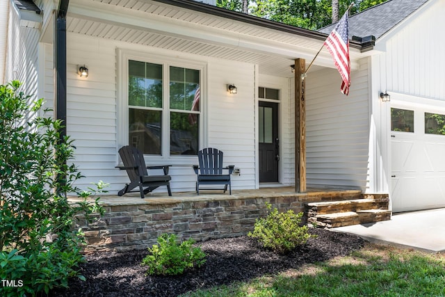 136 Hatchet Cv, Louisburg, NC 27549 - property entrance featuring a porch