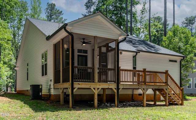 136 Hatchet Cv, Louisburg, NC 27549 - rear view of property with a sunroom, central air condition unit, a ceiling fan, roof with shingles, and a deck