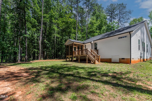 136 Hatchet Cv, Louisburg, NC 27549 - back of house featuring crawl space, stairs, a wooden deck, and a yard