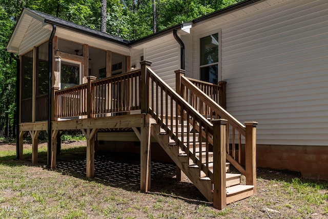 136 Hatchet Cv, Louisburg, NC 27549 - wooden terrace with a sunroom