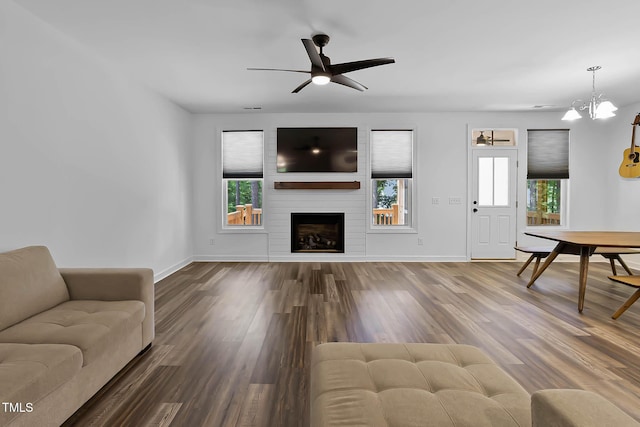 136 Hatchet Cv, Louisburg, NC 27549 - living area featuring healthy amount of natural light, ceiling fan, a chandelier, and baseboards